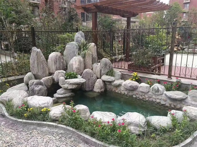 博尔塔拉庭院假山鱼池制作视频